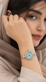 ساعت مچی زنانه طرح کوارتز مدل بنگلی فیروزه ای